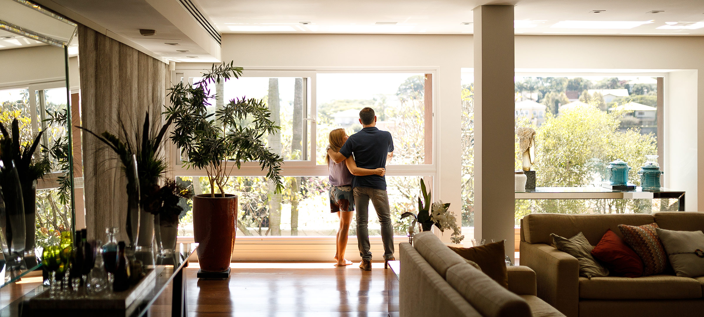 Couple looking out window.