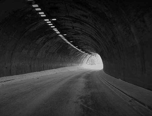Approaching light at opening end of auto tunnel