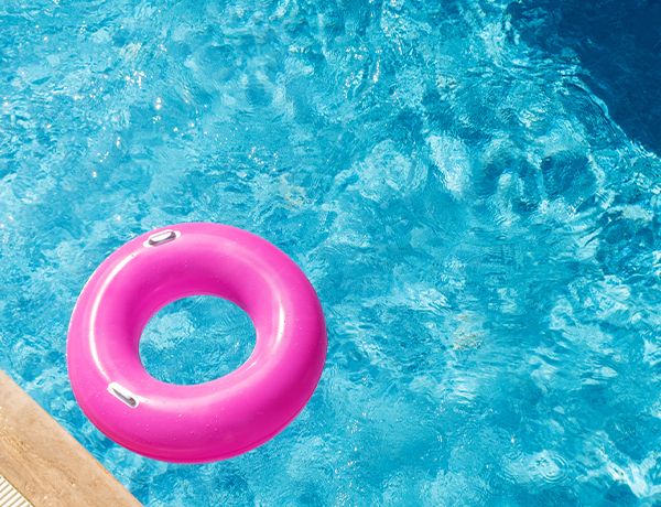 Pink innertube floating in a pool